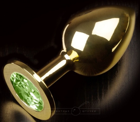 Золотистая анальная пробка с салатовым кристаллом - 9 см. - Пикантные штучки - купить с доставкой в Екатеринбурге