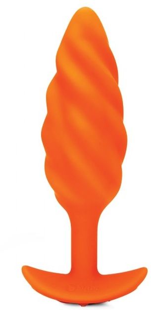 Оранжевый спиральный анальный виброплаг Swirl - 13,5 см. - b-Vibe
