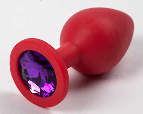 Красная силиконовая анальная пробка с фиолетовым стразом - 8,2 см. - 4sexdreaM - купить с доставкой в Екатеринбурге